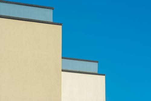 A close up of a building with a blue sky