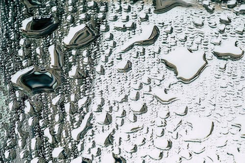 A close up of water droplets on a window