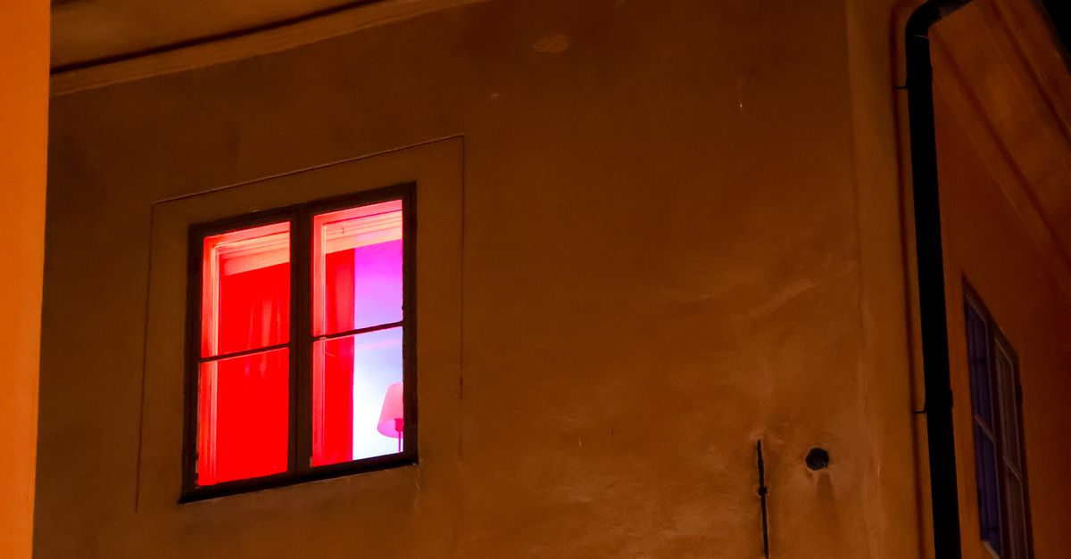 Red Inside Window Red Light in a Window · Free Stock Photo