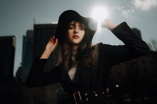 A Young, Fashionable Woman Posing in City 