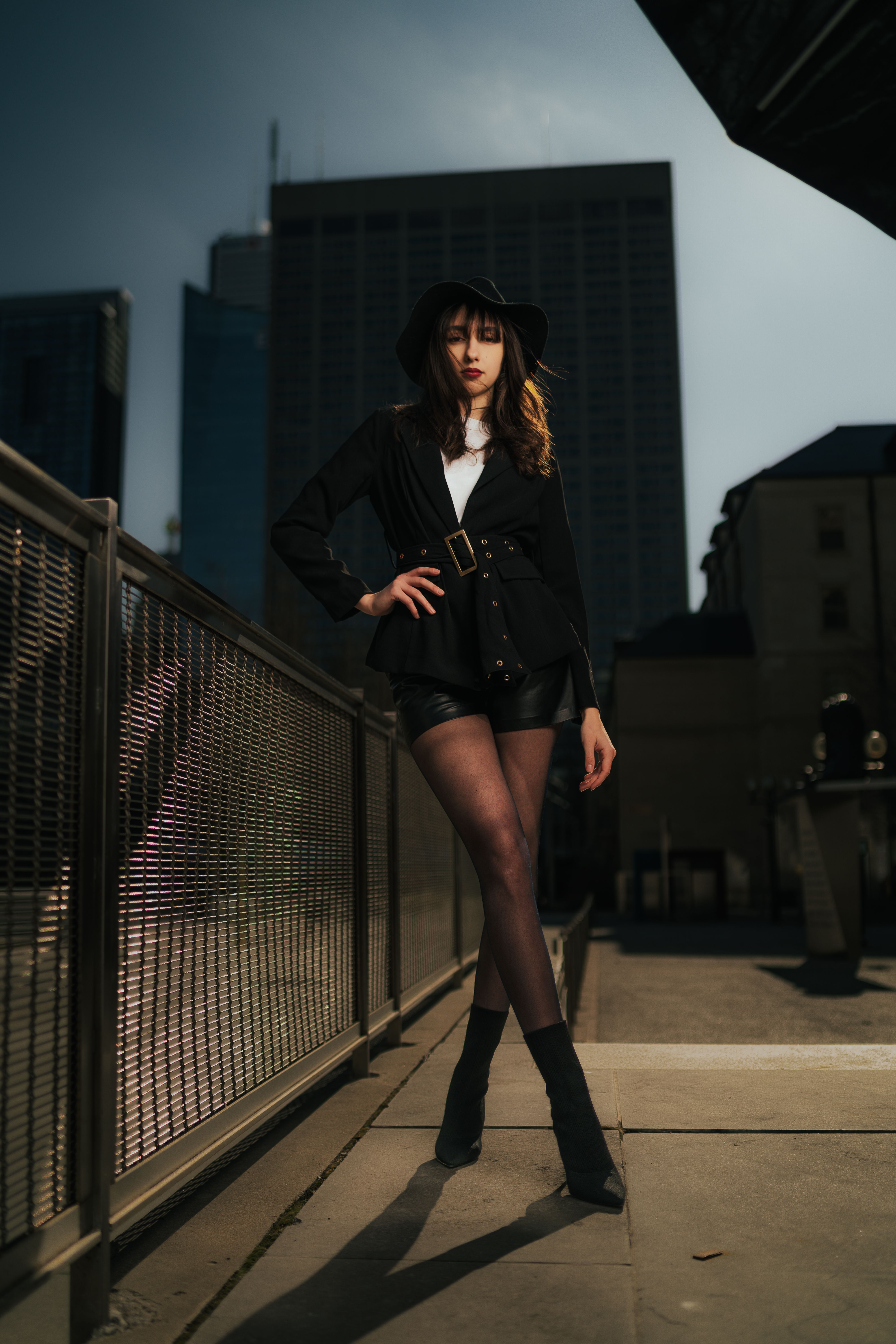 A Young, Fashionable Woman Posing in City · Free Stock Photo
