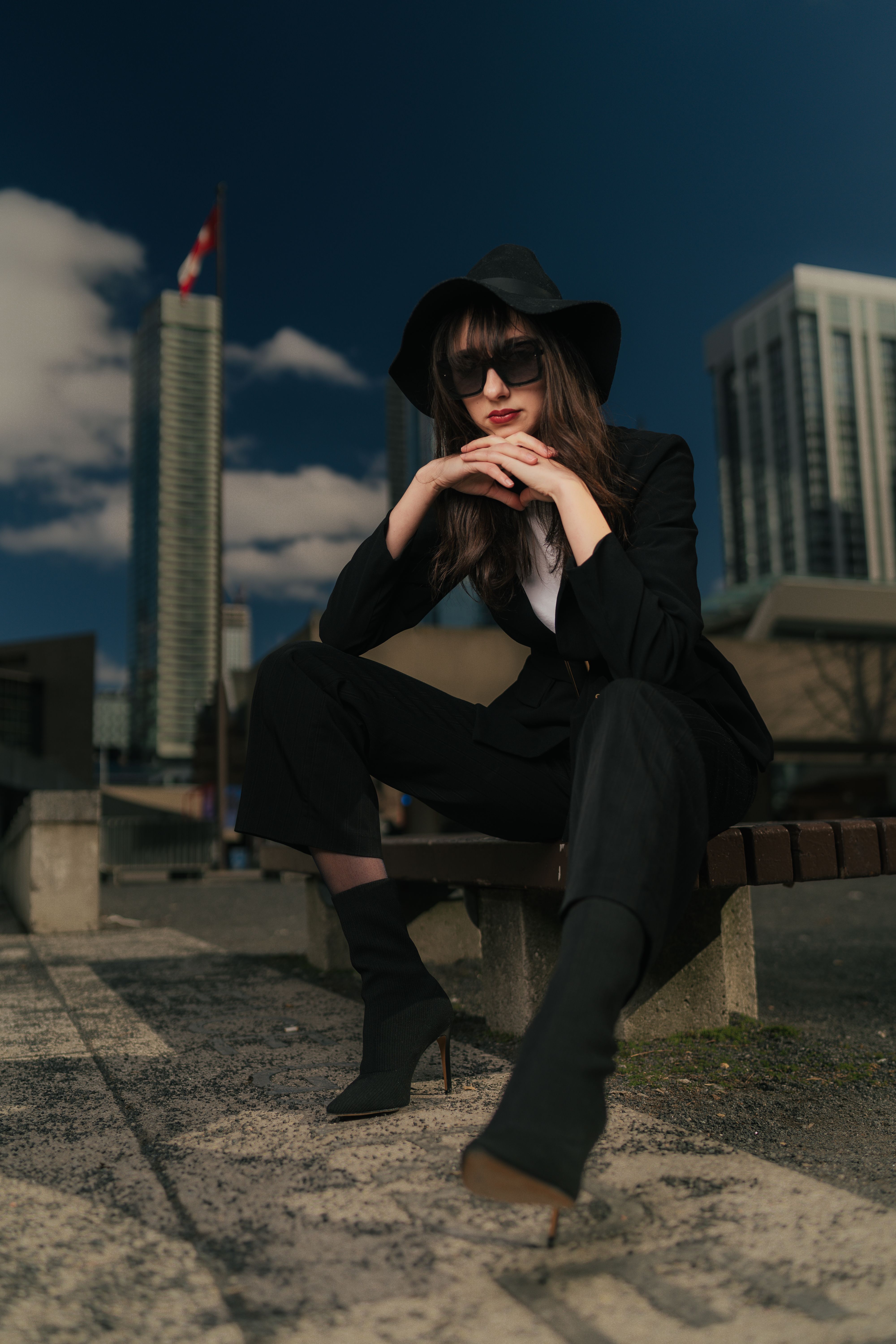A Young, Fashionable Woman Posing in City · Free Stock Photo