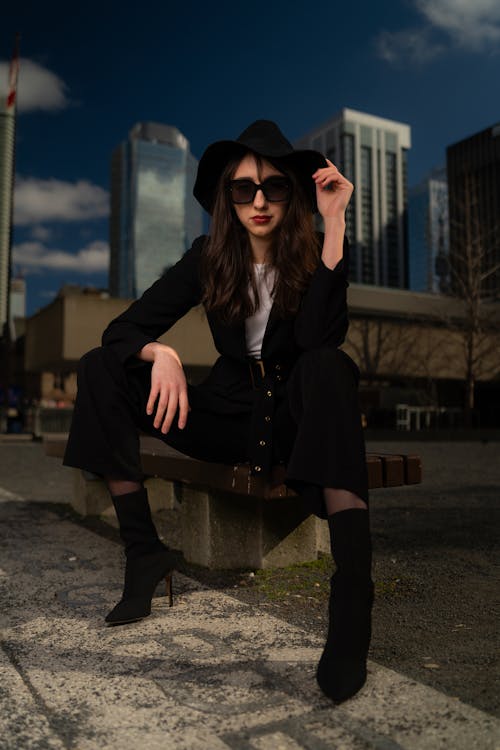 A Young, Fashionable Woman Posing in City 