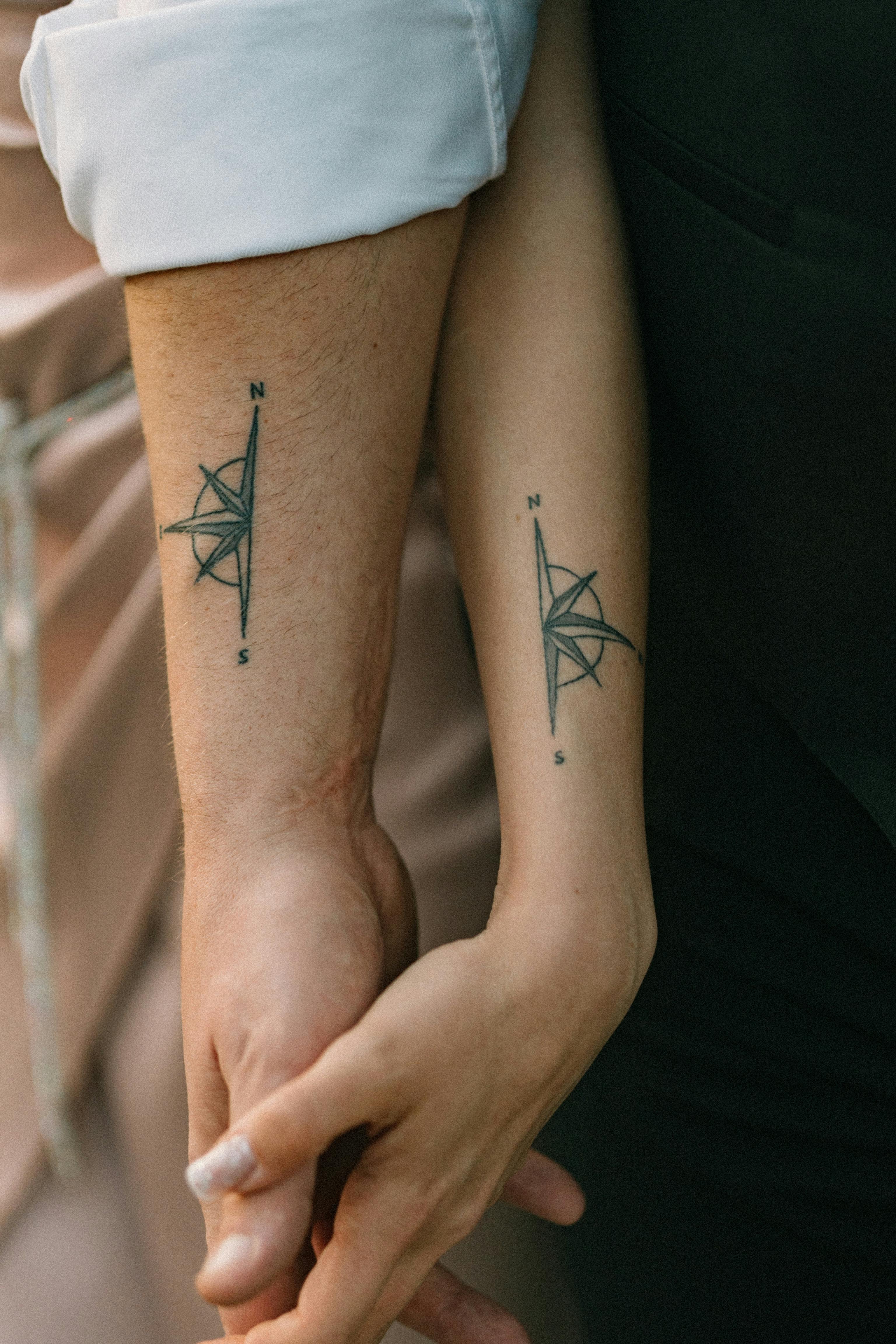 Matching Cross Tattoos That Bind Couples