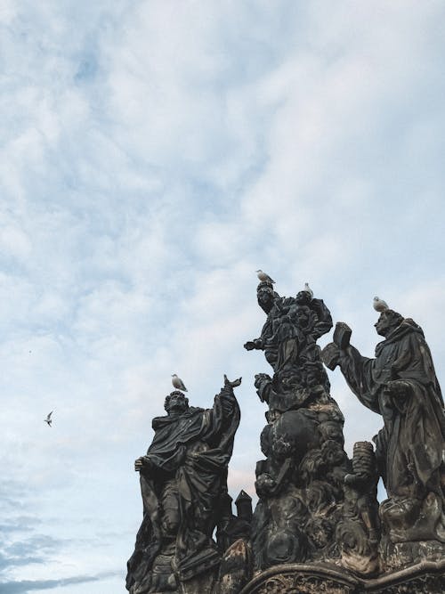 The statue of the three wise men is on top of a building