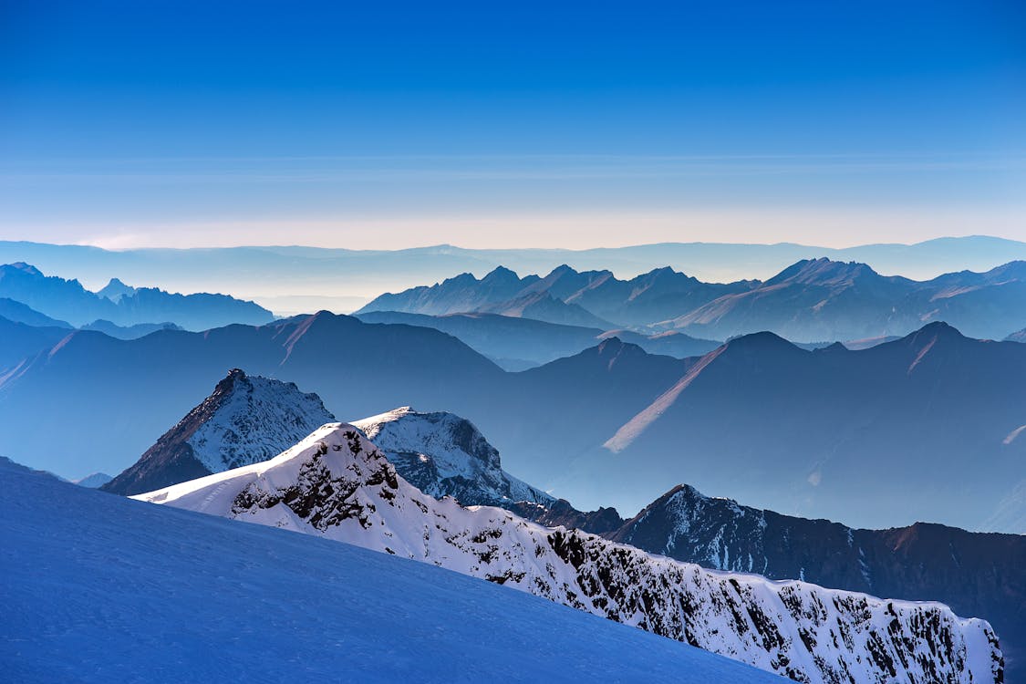 Free Landscape Photo Of Snow Covered Mountains Stock Photo