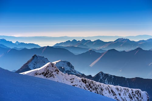 Free Landscape Photo Of Snow Covered Mountains Stock Photo