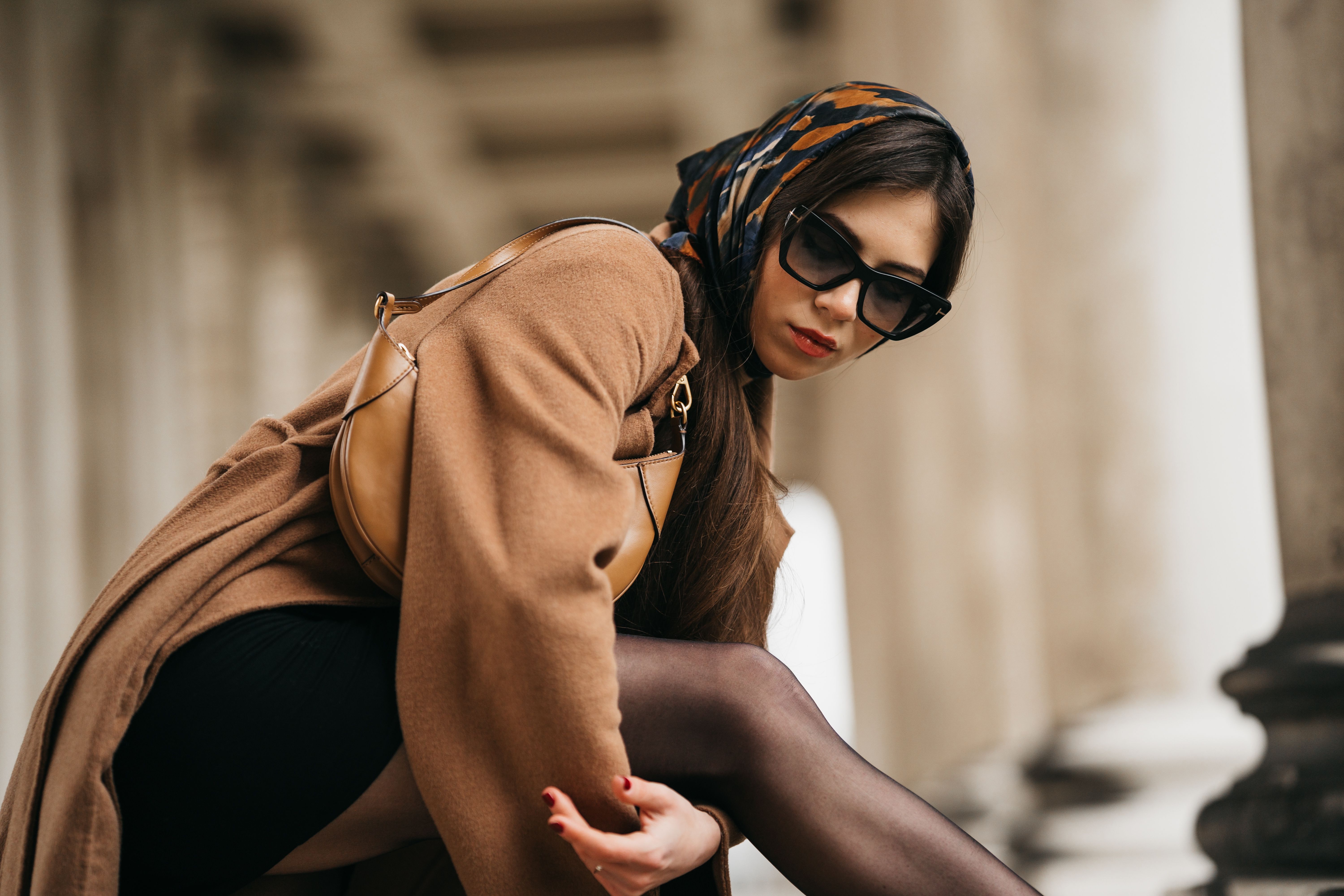 Chic woman in brown coat