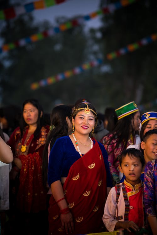 A woman in traditional clothing at a festival