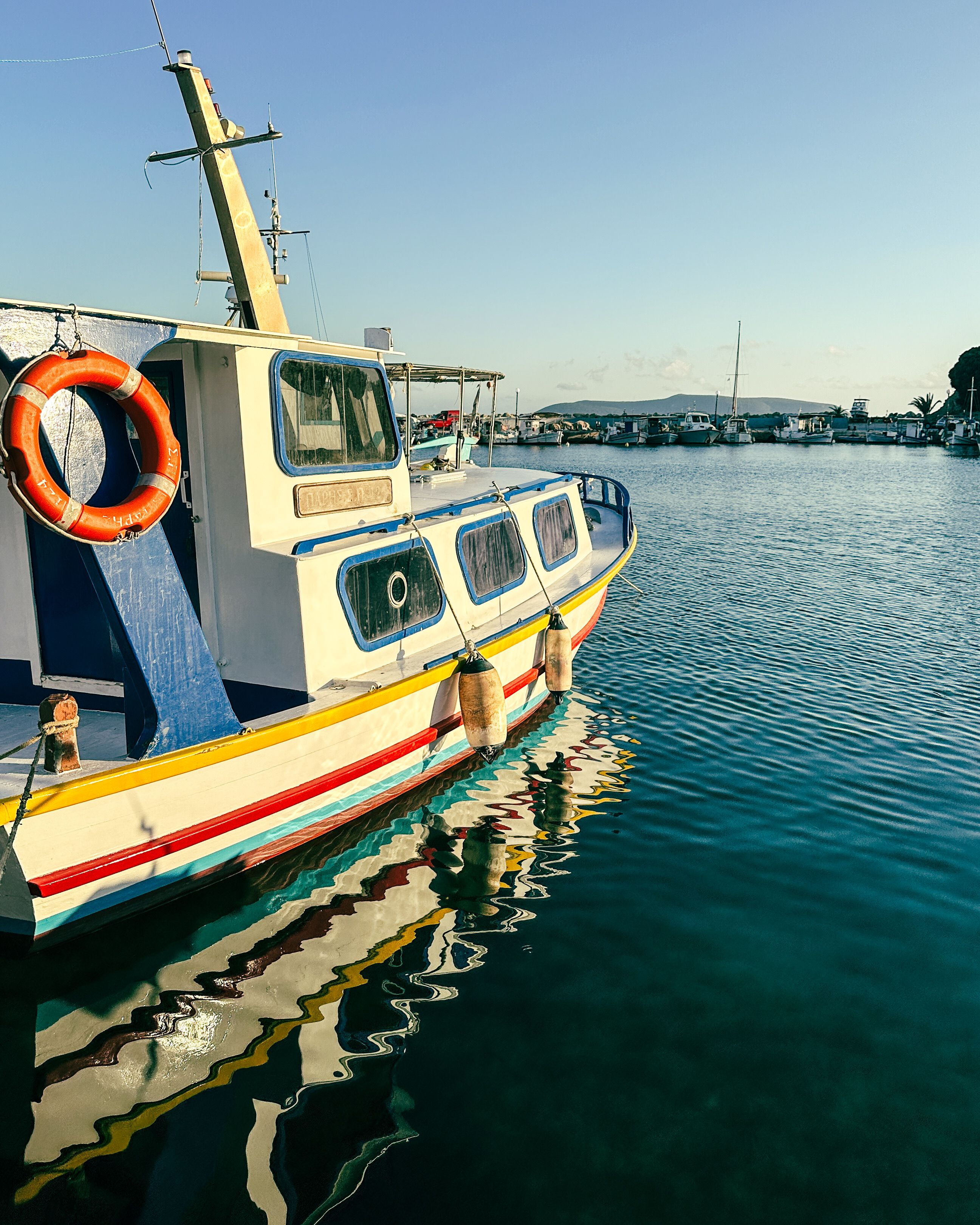 Fishing Boat in a Bay · Free Stock Photo