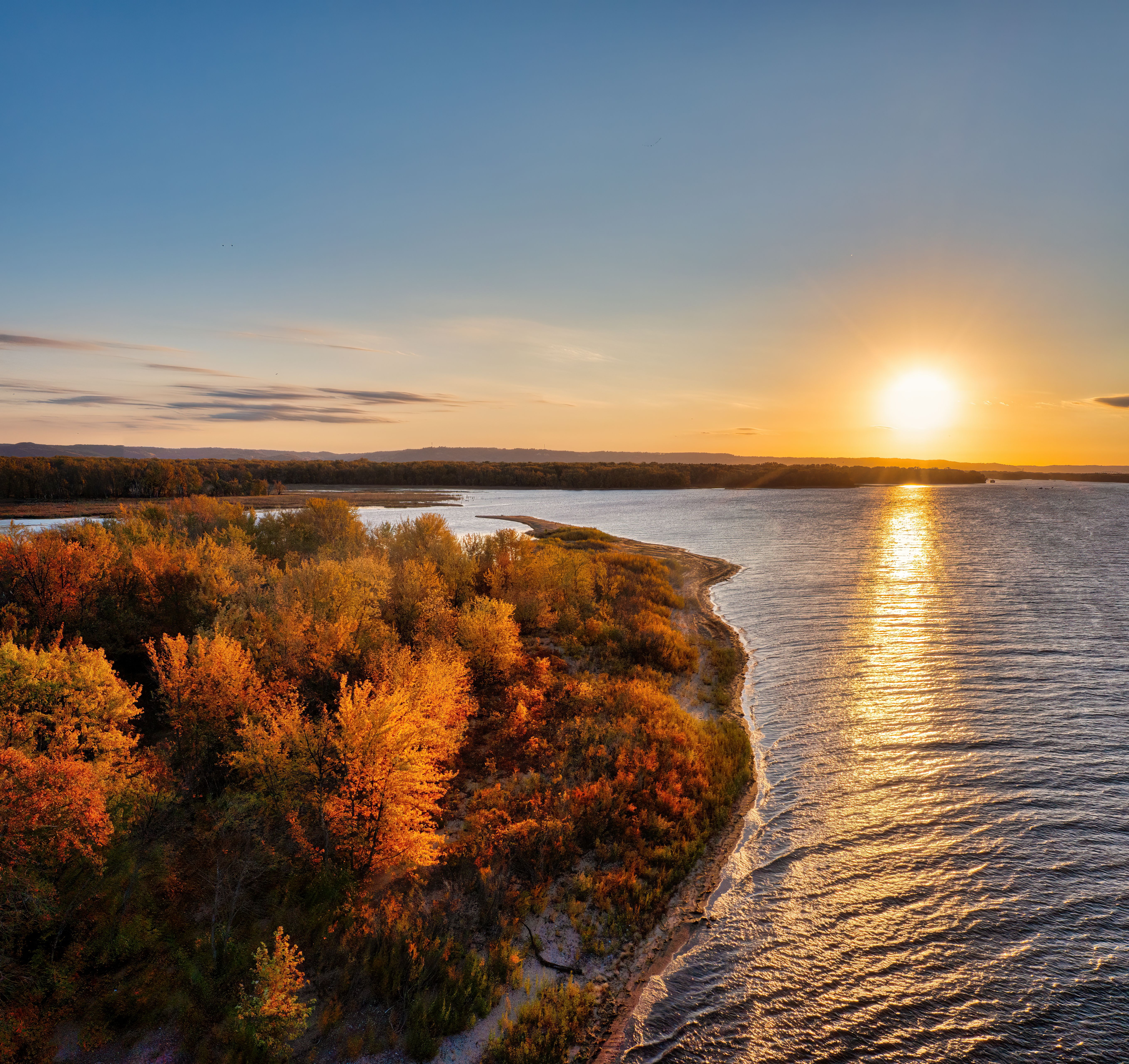 Sunset Over the River Amidst the Autumn Forest · Free Stock Photo