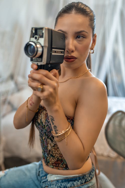 Woman Holding a Camera 