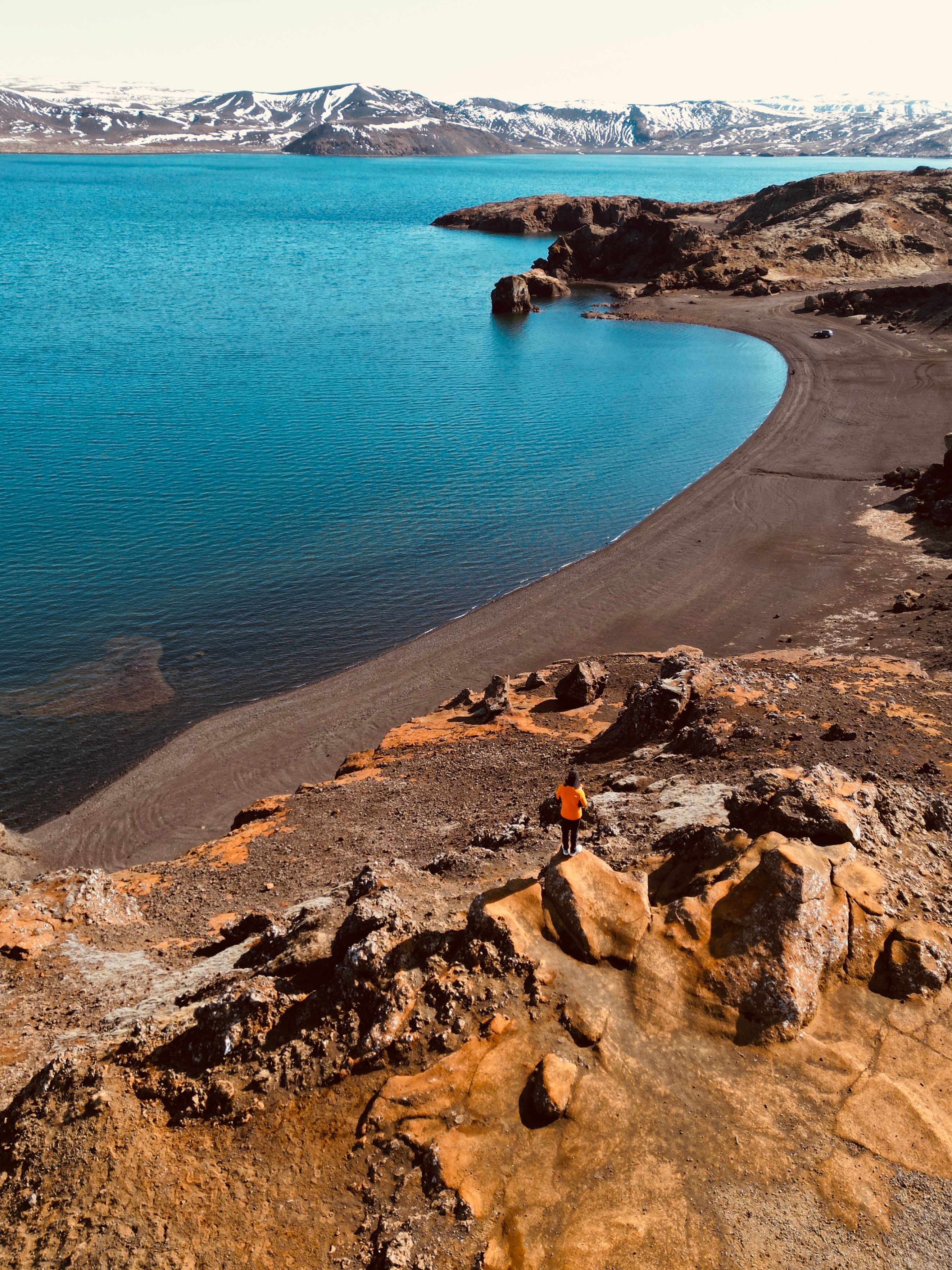 Explore a remote coastline with stunning views and rocky terrain.