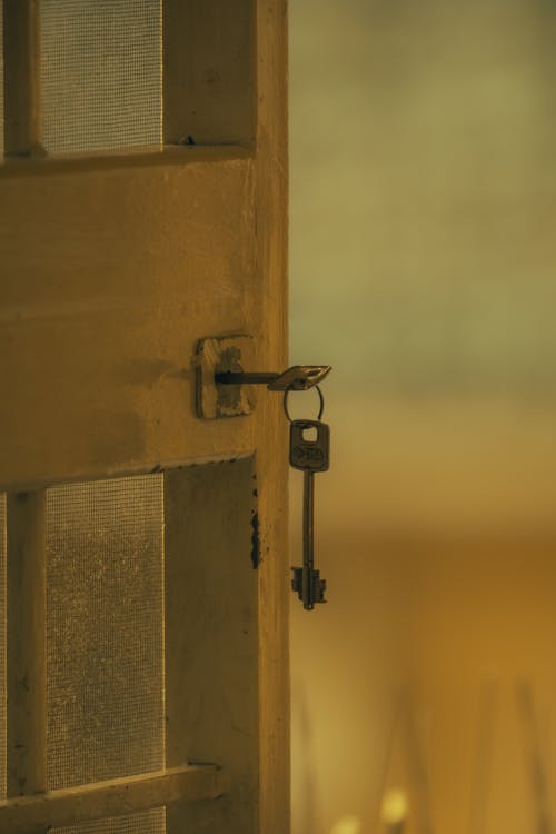 A key is shown in a door
