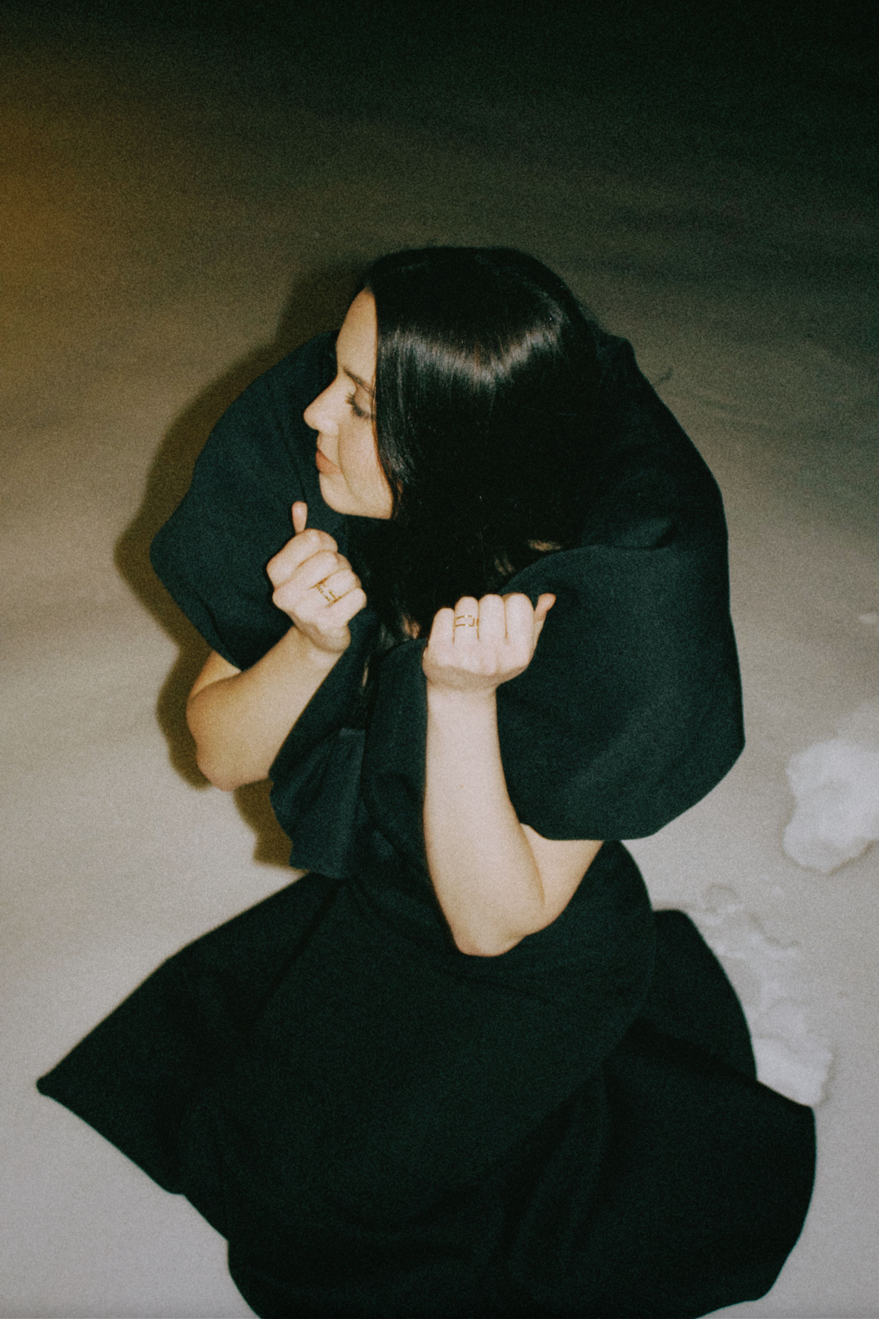 Woman Posing in Black Dress on a Beach at Night · Free Stock Photo