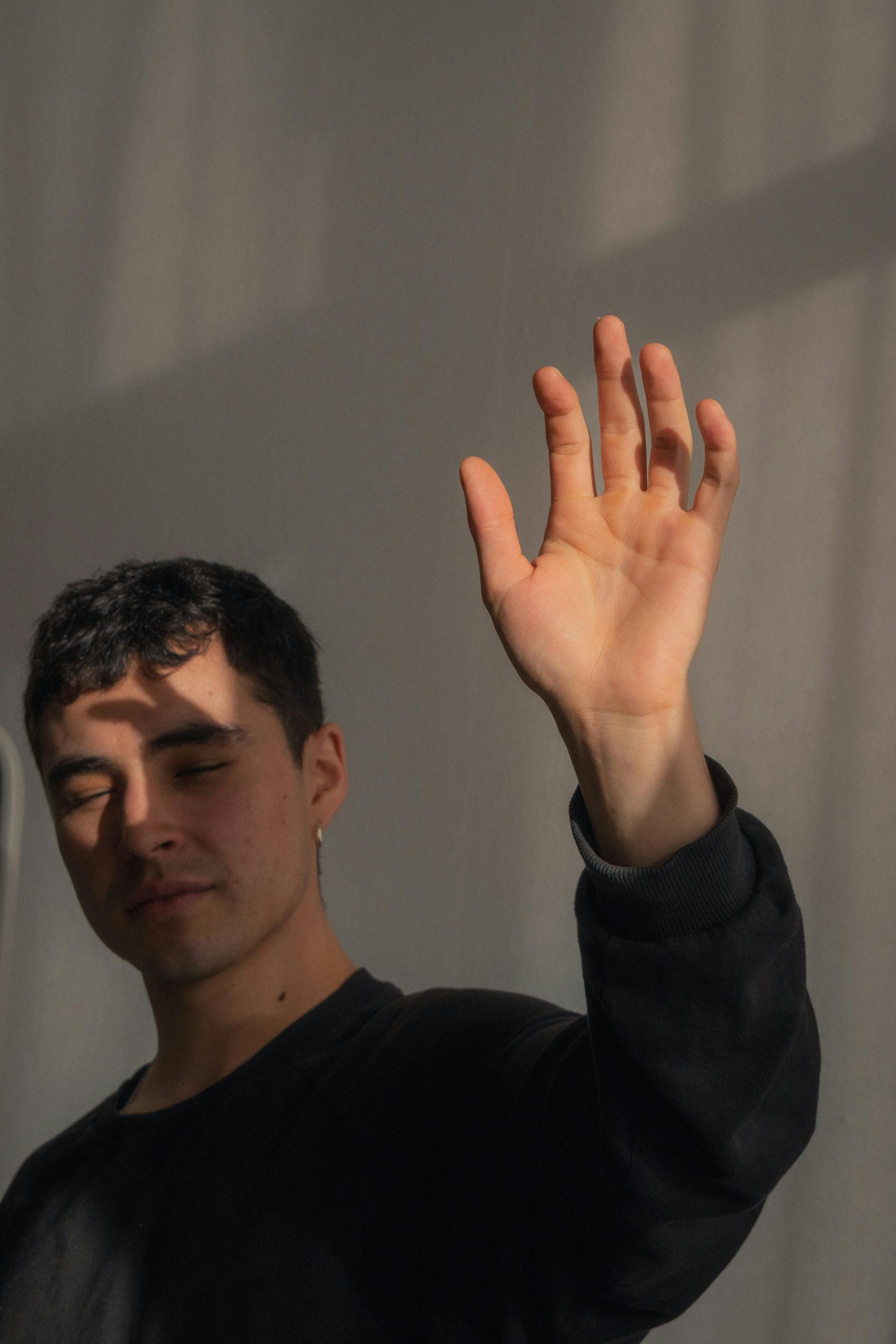 portrait of man in shadow on face