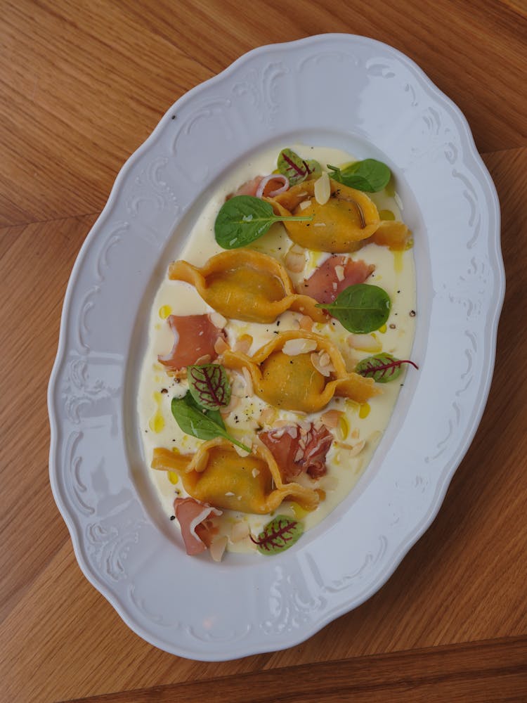 Tortellini Served With Meat In Butter Sauce