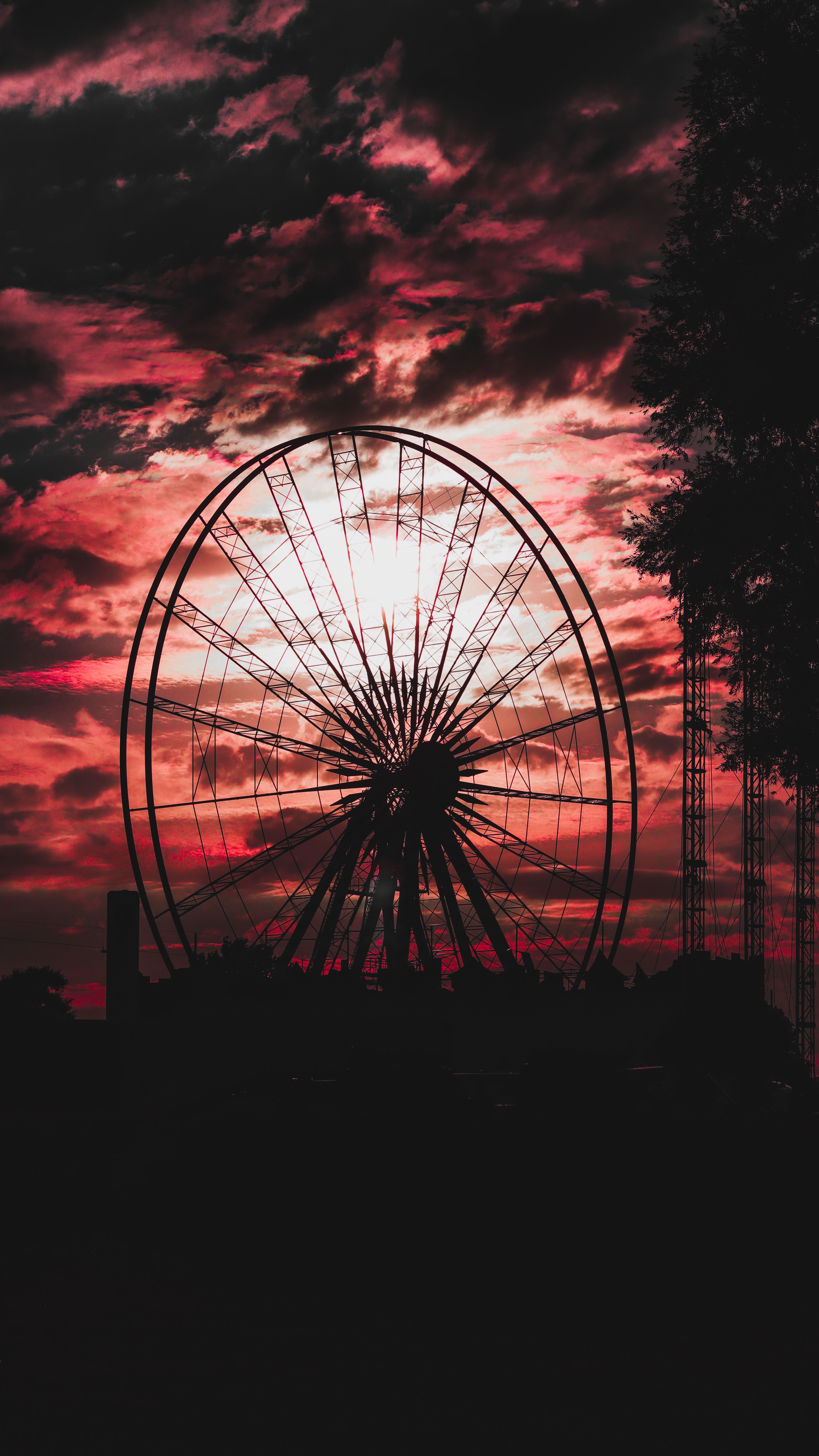 Silhouette of a Ferris Wheel During Sunset · Free Stock Photo