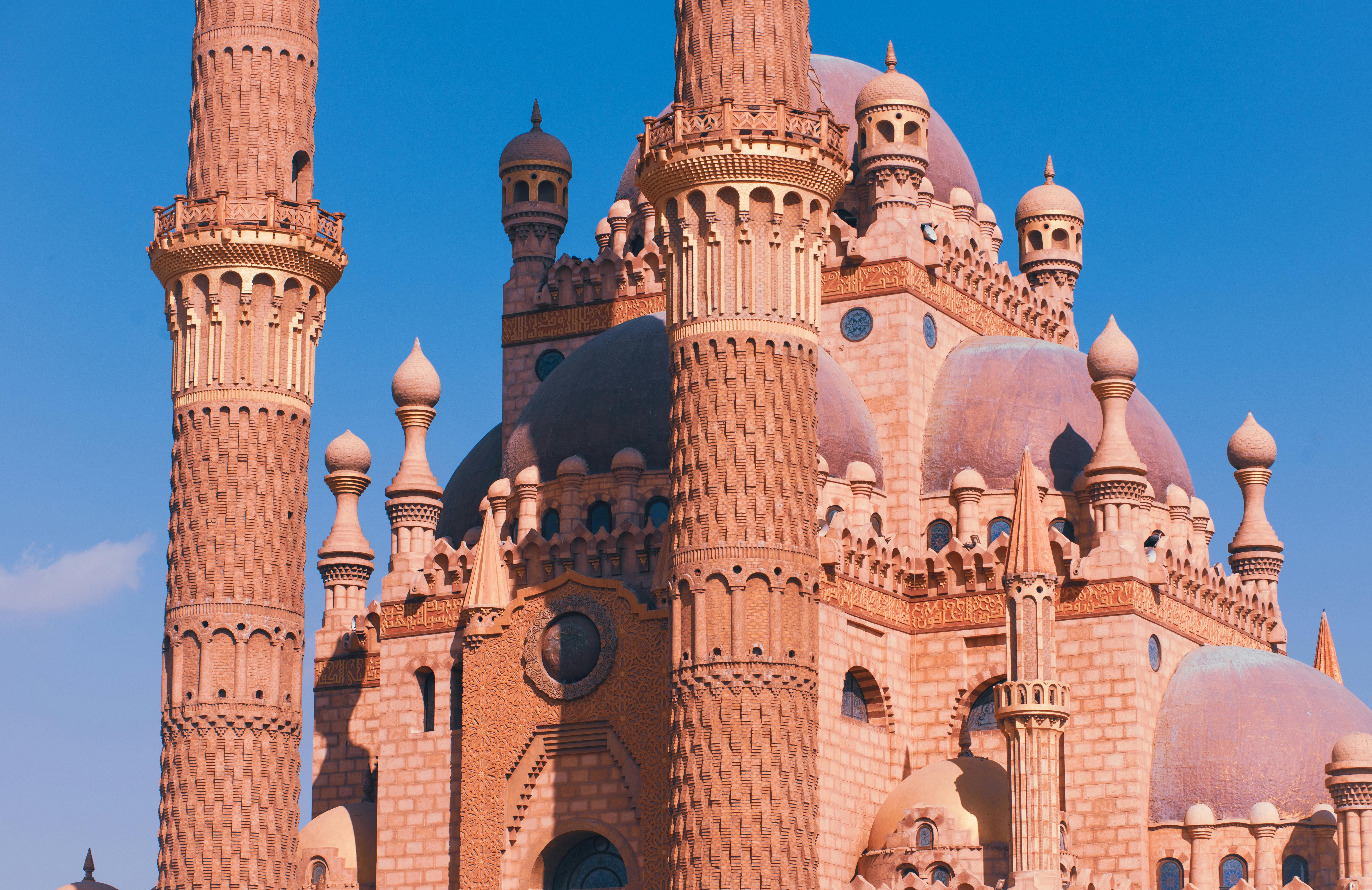 An aerial view of a city next to a body of water.