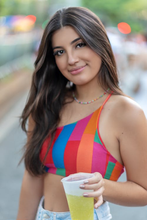 Smiling Woman in Colorful Top 