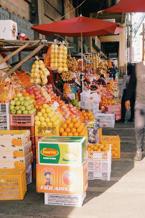 Foto profissional grátis de bazar, caixa, cidade