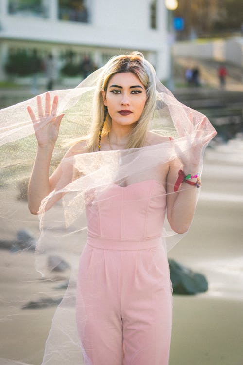 Blonde in Pink Outfit with Veil