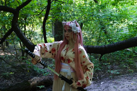 Striking anime cosplay with katana amidst a lush forest. Perfect for fantasy themes.