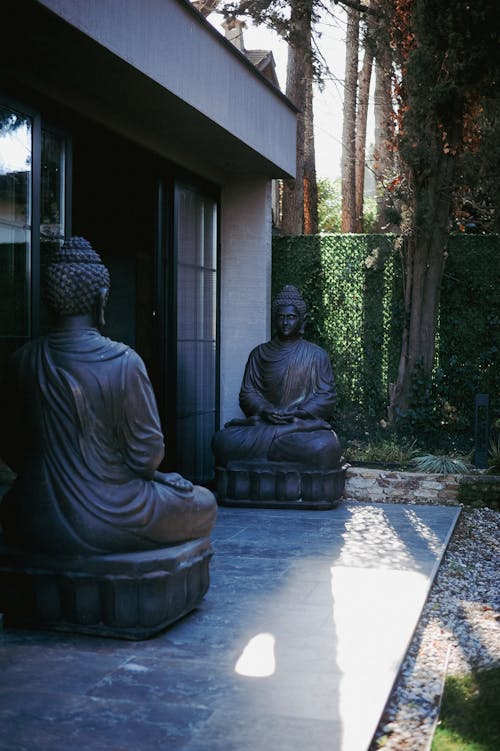 Modern Building Entrance with Buddha Statues