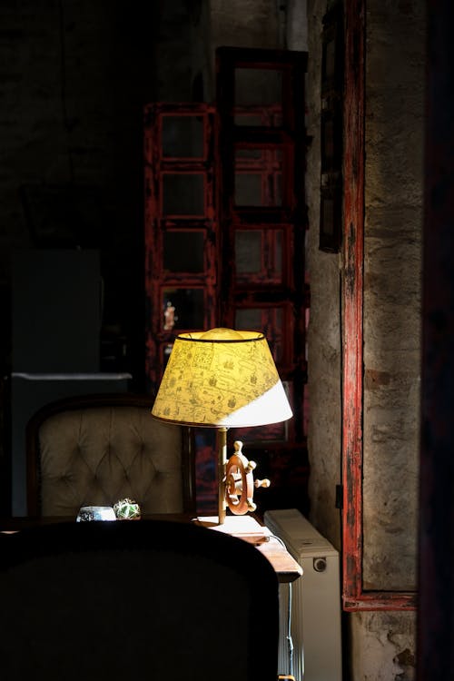 A Vintage Lamp Standing on a Table 