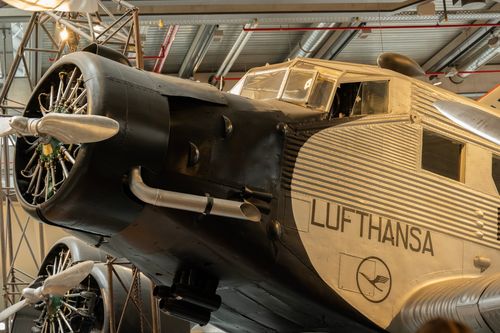 Free Close-up of a classic Junkers JU 52 aircraft at an aviation museum, showcasing its historic design. Stock Photo