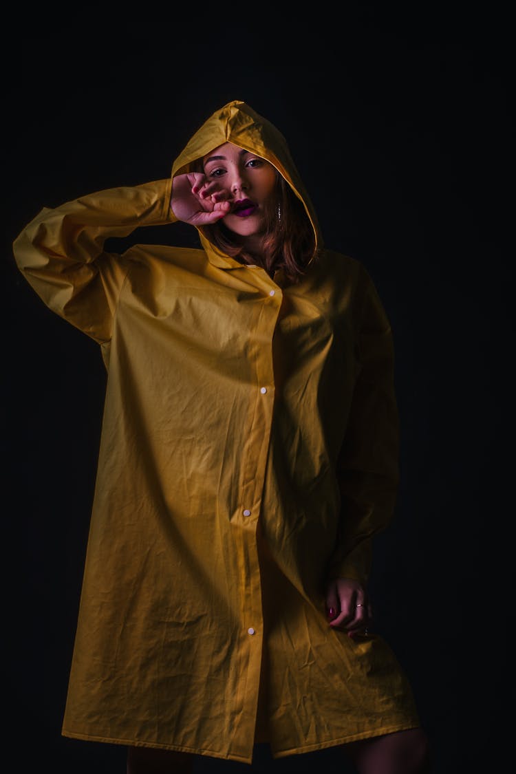 Woman Wearing Yellow Raincoat