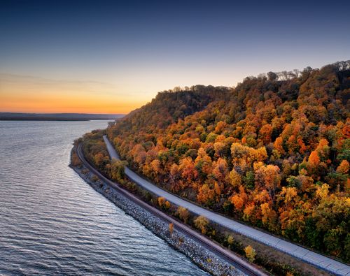 Free Scenic autumn colors along a winding road by Maple Springs, Minnesota at sunset. Stock Photo
