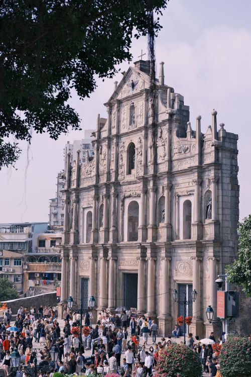 Free Vibrant scene of crowds visiting the iconic Ruins of St. Paul's in Macau, China. Stock Photo