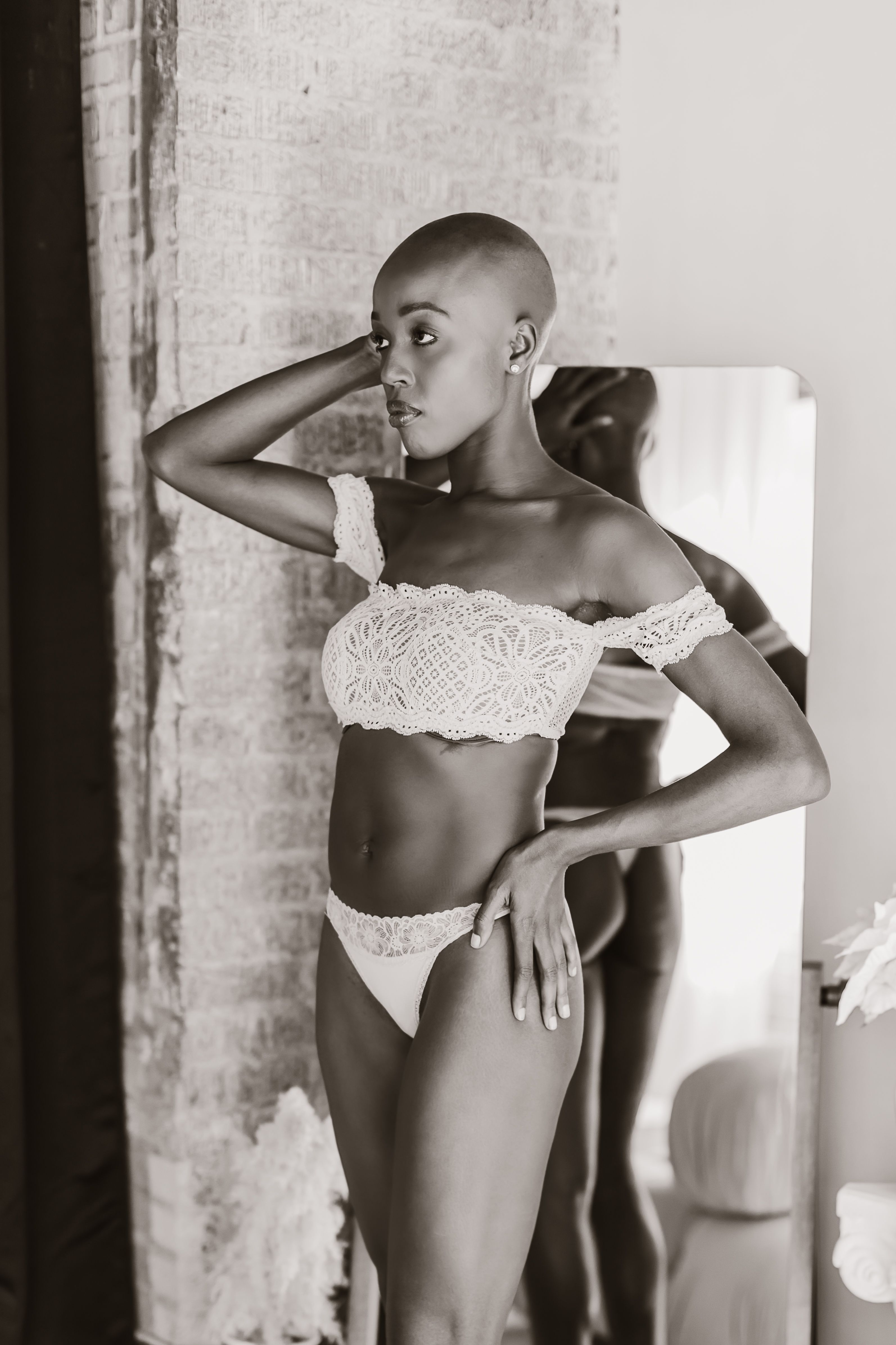 Beautiful Bald Woman in White Lingerie  Free Stock Photo