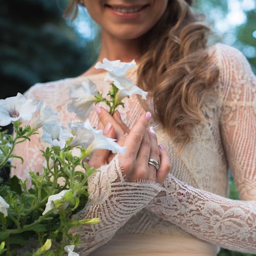 Woman Hands Holding Flowers