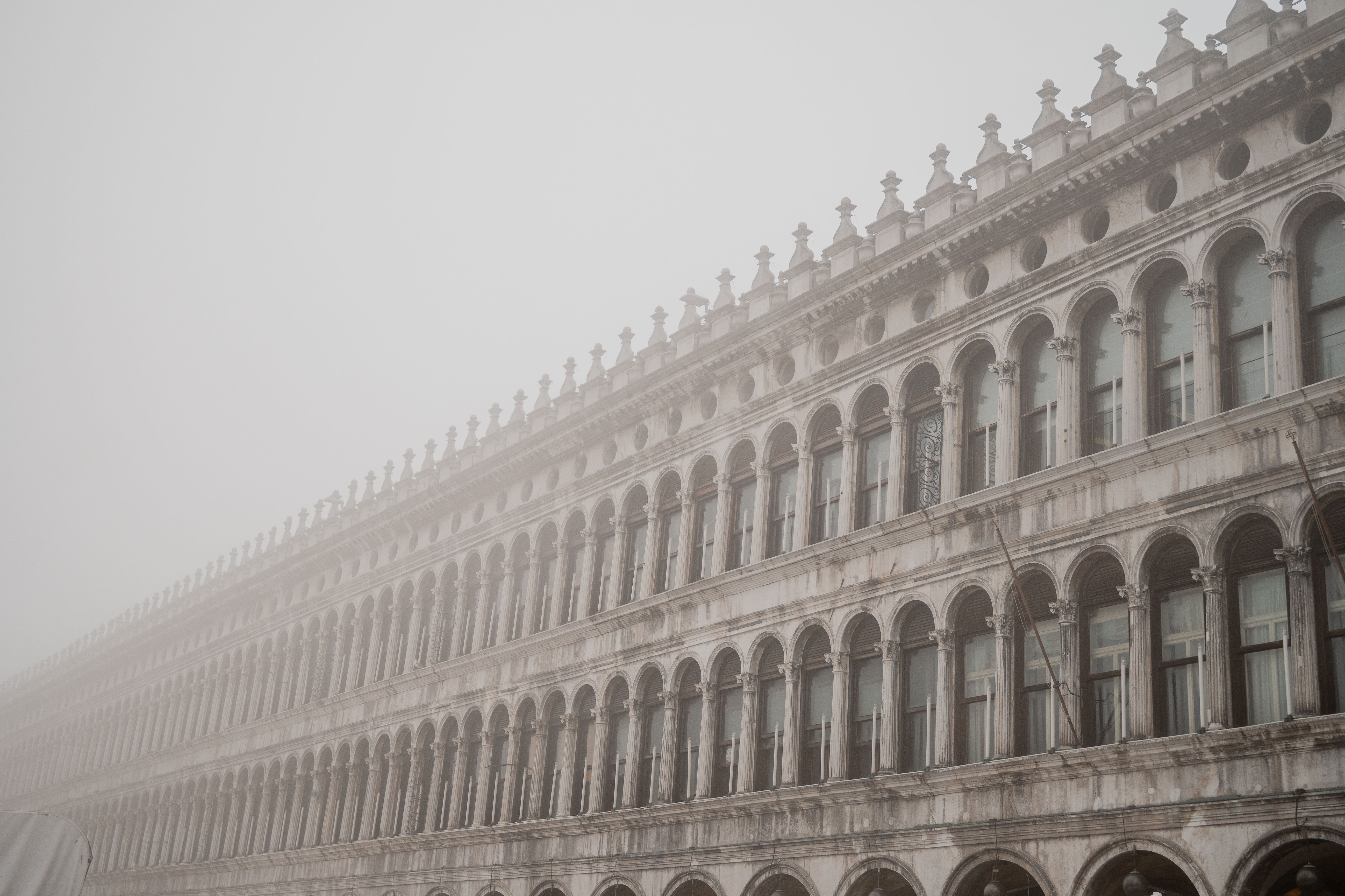 Misty view of the Procuratie Vecchie in Saint Mark's Square, Venice.