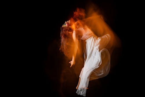 Free Blurred Motion of Dancing Woman Stock Photo