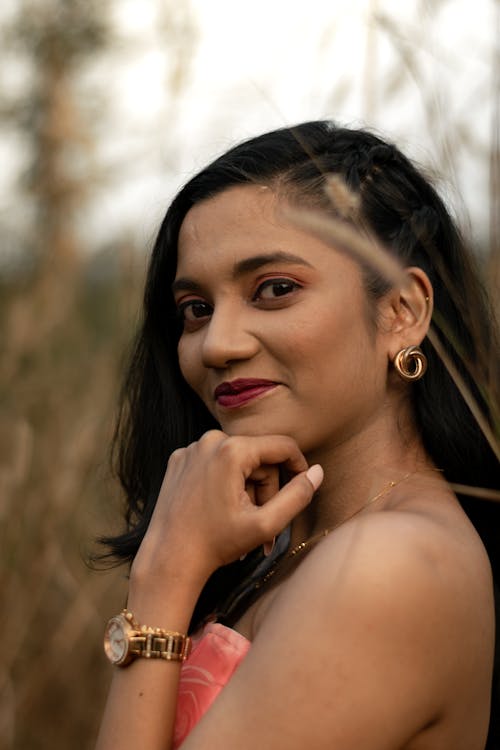 Smile Woman with Golden Wristwatch