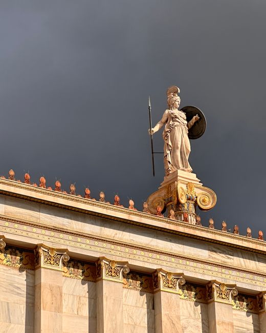 Actor portraying Odysseus standing on a ship's bow