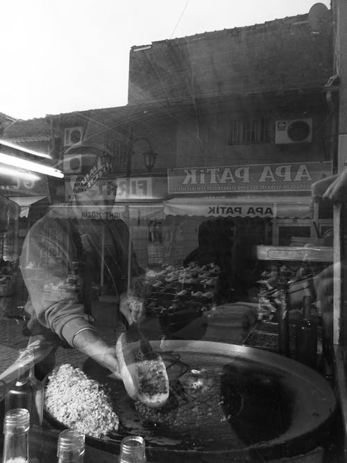 Working Man Reflection in Window in Black and White