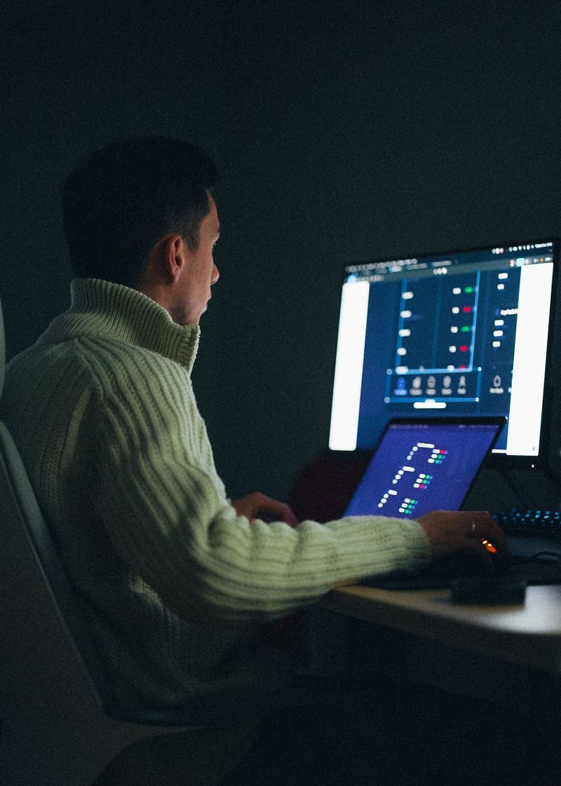 Professional working on AI analytics at night