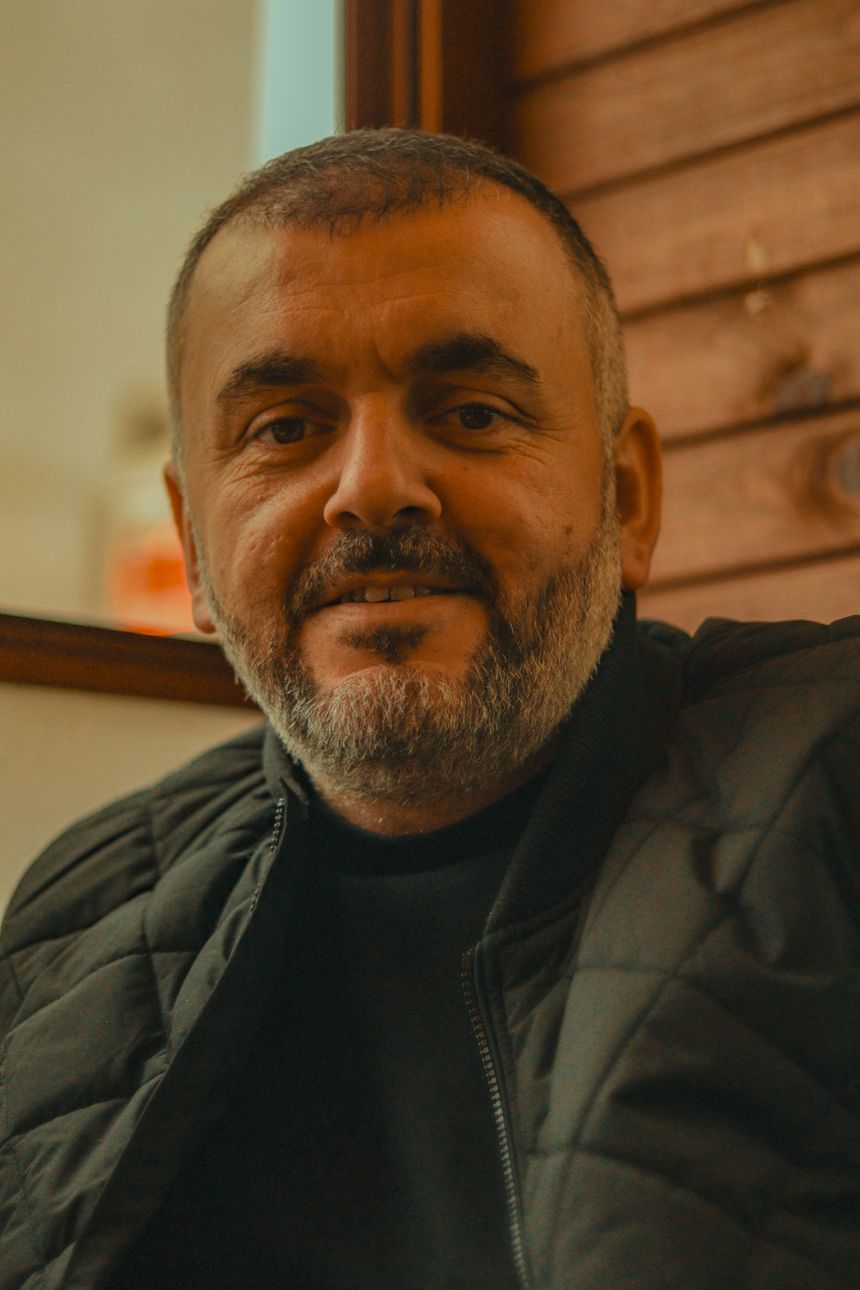 Close-up portrait of a bearded man on a live video feed — photo by Murat IŞIK on Pexels