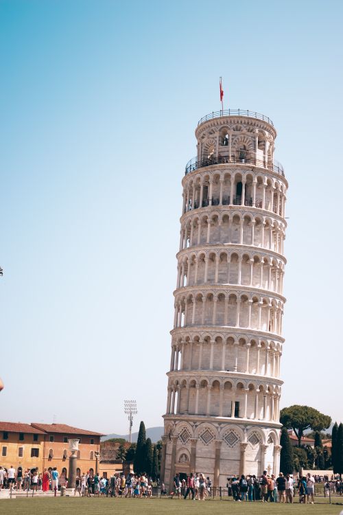 Free Explore the iconic Leaning Tower of Pisa in Italy's Piazza dei Miracoli, a UNESCO World Heritage Site. Stock Photo