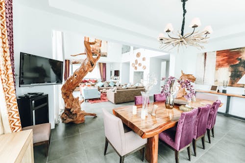 Brown Wooden Dining Set Near Television