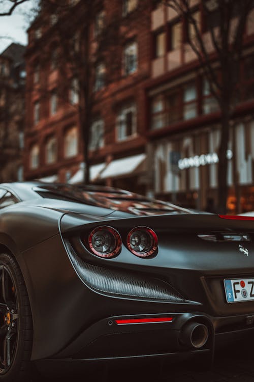 A black sports car parked on the street
