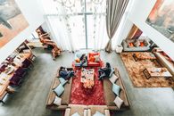 Aerial Photography of Three People Sitting on Sofa