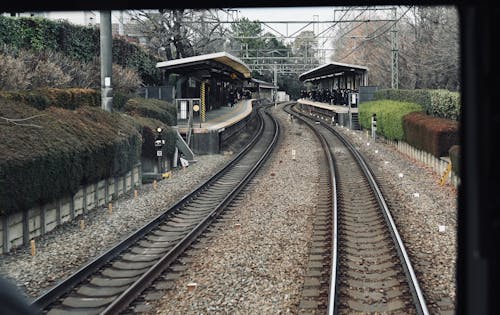 A view of a train track from inside a train