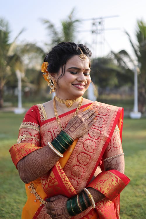 Portrait of Smiling Woman in Traditional Clothing 