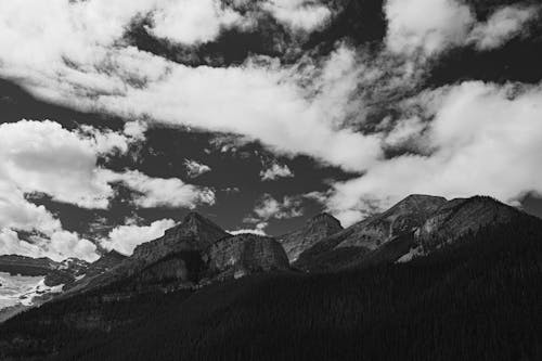 Clouds on Sky over Mountains in Black and White