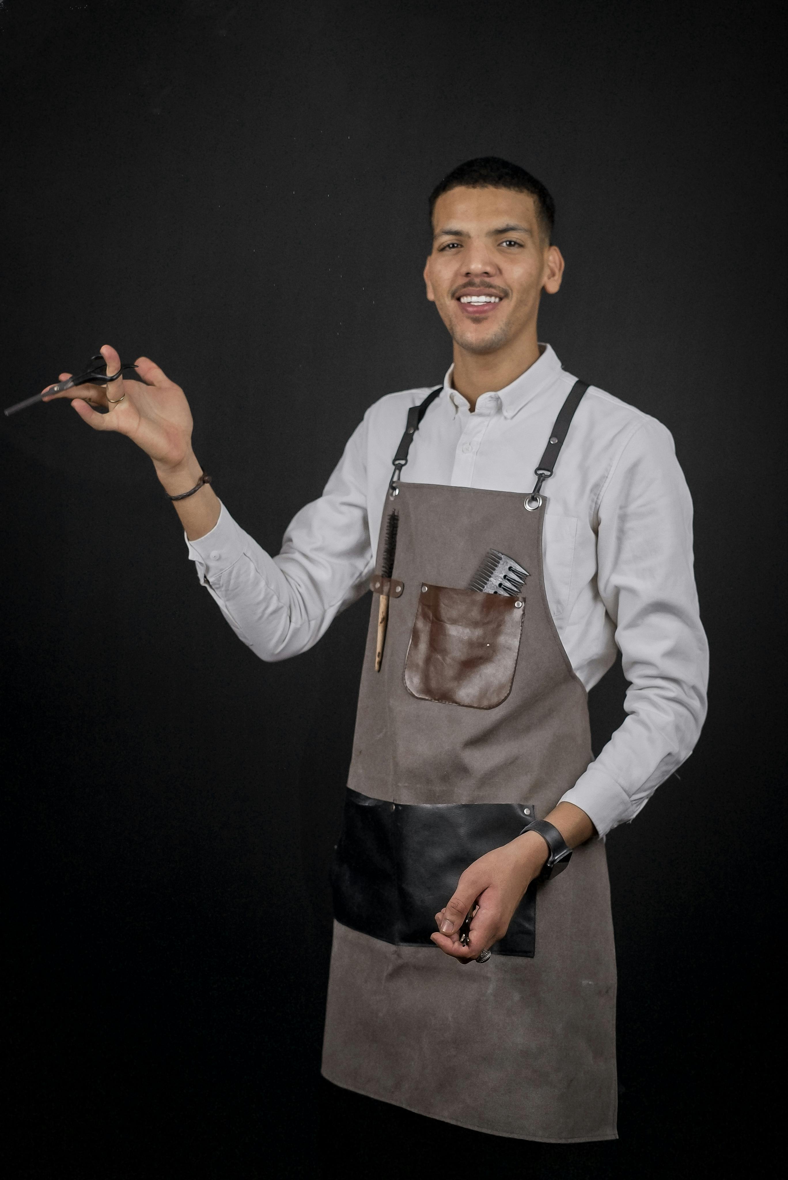 Hairdresser Holding Scissors 